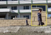 North Korean resident on his mobile phone in a provincial region of the country