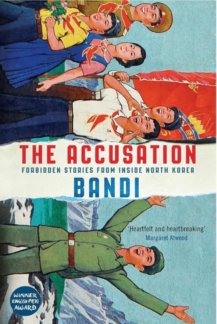 band_north_korea_book_cover Book cover of "The Accusation: Forbidden Stories from Inside North Korea" by Bandi, featuring socialist realist-style illustrations of North Korean figures split across a torn page design, with a blurb from Margaret Atwood and the English PEN Award seal.