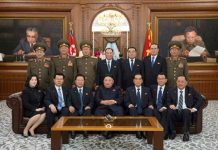Recently returned Kim Yong Chol may focus on earning funds for regime Kim Yong Chol (upper row in the center) in photo with newly-elected members of state leadership bodies on April 12.