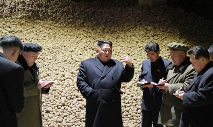 North Korean leader Kim Jong Un during an inspection of the Samjiyon Potato Farina Production Factory in Samjiyon County, Ryanggang Province in October 2018