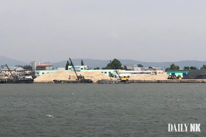 Sand at Sinuiju port for regional construction projects (taken in September 2019)