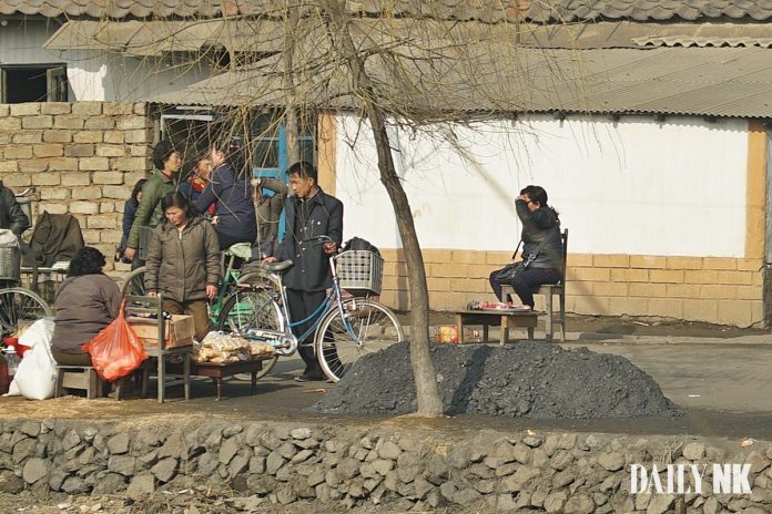 A picture of a streetside market in North Korea.