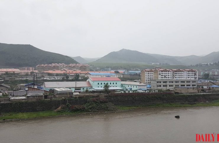 A teen’s vow to catch leeches moves North Koreans to tears Panoramic view of Hyesan city in Ryanggang province, North Korea, with the Yalu River in the foreground, August 2018