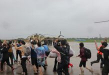 N. Korea turns flooding into opportunity for spreading propaganda flooding, portraits