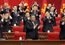 North Korean leader Kim Jong Un applauds as he attends the Ninth Congress of the Workers' Party of Korea (WPK) in Pyongyang, North Korea.