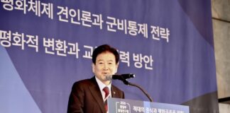 Unification Minister Chung Dong-young delivers opening remarks at a joint Ministry of Unification and KINU symposium in Seoul on March 25, 2026