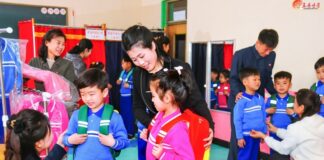 North Korean parents push back on tailored school uniform policy Children receive new school uniforms and backpacks at a distribution event in North Korea, in a photo published by the Rodong Sinmun state newspaper.