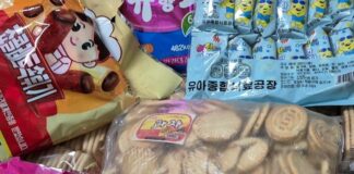 North Korean cookies and candy bags from the Pyongyang Infant Comprehensive Food Factory, bearing Korean-language labeling