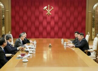 China’s bold and audacious strategic initiative that escaped most experts’ attention Kim Jong Un meets Chinese Foreign Minister Wang Yi at a conference table in Pyongyang, with the Workers' Party of Korea emblem on the wall behind them