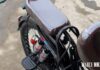 Rear wheel of a North Korean electric bicycle fitted with a shock absorber for load-bearing modifications
