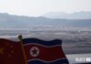 North Koreans in China forced repatriation: flags near the Tumen River border, North Hamgyong province