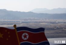 North Koreans in China forced repatriation: flags near the Tumen River border, North Hamgyong province