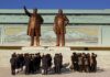 North Korea steps up surveillance to erase belief the two Koreas are “one people” Crowds bow before the bronze statues of Kim Il Sung and Kim Jong Il at Mansudae Grand Monument, Pyongyang, October 2012
