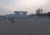 Kim Il Sung and Kim Jong Il portraits on a public square in Sariwon, North Hwanghae province, North Korea