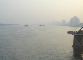 In China, North Koreans hear they’re the poor ones View from a train crossing the Yalu River, with China visible on the right and North Korea on the left