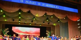 North Korean children perform on stage at the Mangyongdae Schoolchildren's Palace arts group concert in Pyongyang, Feb. 13, 2026.