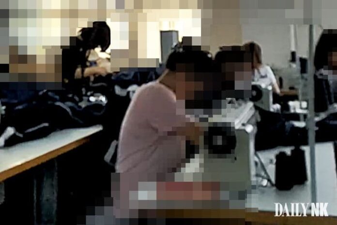 A North Korean female worker at a garment factory in Liaoning province, China