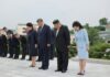Kim Jong Un and Xi Jinping bow with their wives at the Friendship Tower in Pyongyang during the June 2026 visit at the center of the Kim Ju Ae succession debate.