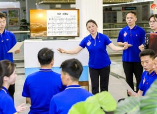 Pyongyang recycles old anthem to build loyalty to Kim Jong Un Employees at North Korea's Central Industrial Art Bureau sing songs expressing loyalty to the leader, as reported by Rodong Sinmun on July 8, 2025
