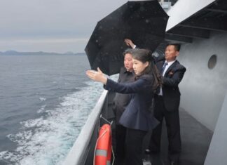 Kim Jong Un and his daughter Kim Ju Ae stand on the deck of the destroyer Kanggun during its sea trials on June 4, 2026