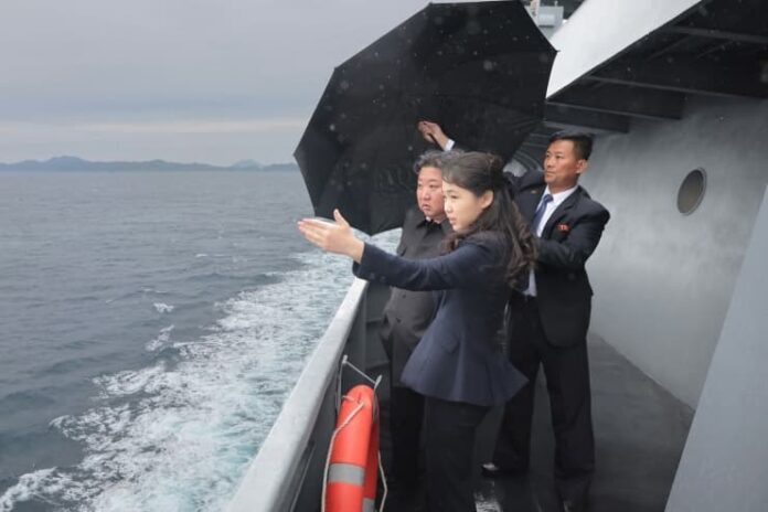 Kim Jong Un and his daughter Kim Ju Ae stand on the deck of the destroyer Kanggun during its sea trials on June 4, 2026