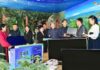 Officials in Chongjin city's Songphyong district, North Hamgyong province, participate in a school support drive during the Month of School Support in March 2024