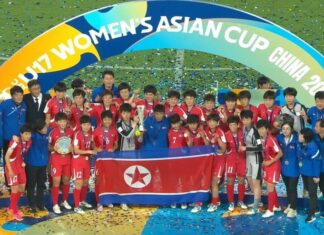 North Korea turns U-17 women’s soccer triumph into propaganda blitz North Korea's U-17 women's soccer team celebrates winning the 2026 Asian Cup with the trophy and national flag