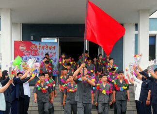 North Korea charges teacher with ‘destruction of state property’ over scratched tablet screen Young volunteers from North Pyongan province depart for construction assignments, carrying a red flag and flower garlands, in a send-off ceremony