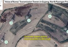 Satellite imagery from June 2, 2025 showing five concrete-based transmission tower pylons, estimated at 60 to 80 meters high, at the Voice of Korea broadcasting facility in Kujang county, North Pyongan province.