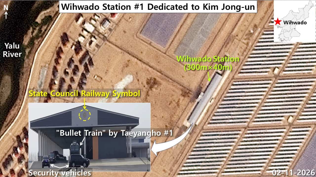 Satellite image of Wihwa Island No. 1 Station in Sinuiju showing the Taeyangho No. 1 armored train inside the enclosed 300-meter platform bearing the State Affairs Commission emblem