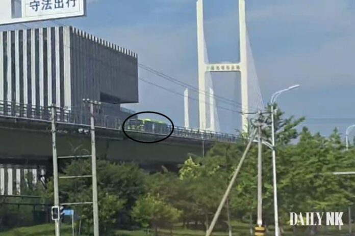 new-yalu-river-bridge-bus-trial-run Bus crossing the New Yalu River Bridge toward Sinuiju, North Korea