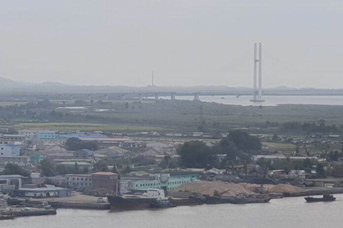sinuiju-view-from-dandong-china View of Sinuiju, North Pyongan province, seen from Dandong, China