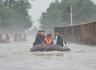 North Korea’s Sinuiju underwater again as drainage system fails Kim Jong Un rides an inflatable rescue boat through floodwaters while touring flood-damaged Sinuiju, North Korea, in July 2024.