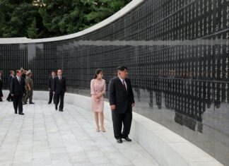 Kim Ju Ae’s contrasting expressions offer clues to her succession training Kim Jong Un and Kim Ju Ae walk past a wall inscribed with names at the Taesong Mountain Revolutionary Martyrs' Cemetery in Pyongyang, flanked by North Korean officials, during an Aug. 14 visit marking the 81st anniversary of Korea's liberation.