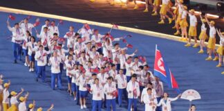 Asian Games athletes face ideology drills before Japan trip North Korean athletes entering the stadium at the 2022 Hangzhou Asian Games opening ceremony