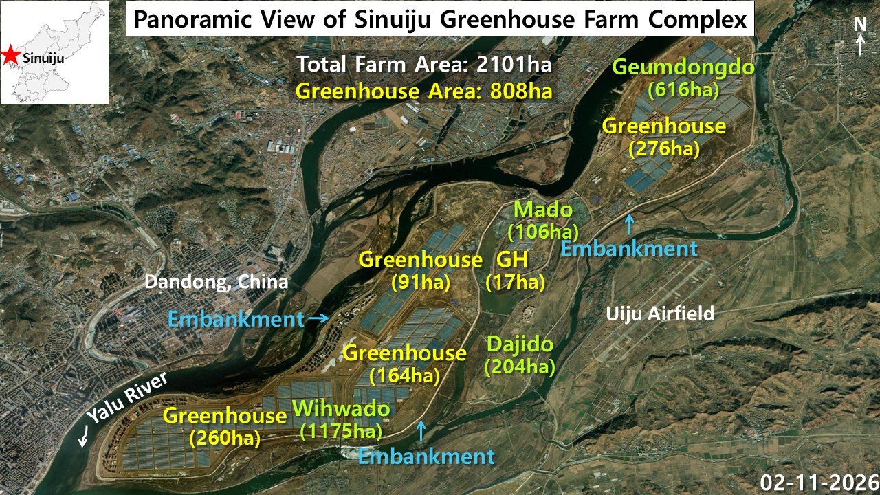 Satellite image of the Sinuiju greenhouse farm spread across four levee-linked islands at the mouth of the Yalu River